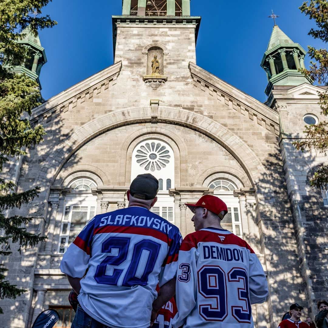 Fans arrive at the Cathedral of Saint-Jean-l'Evangeliste, in Saint-Jean-sur-Richelieu, Quebec, to watch the Montreal Canadiens play the Tampa Bay Lightning during NHL playoff hockey, 2026. | The Canadian Press/Edouard Desroches
