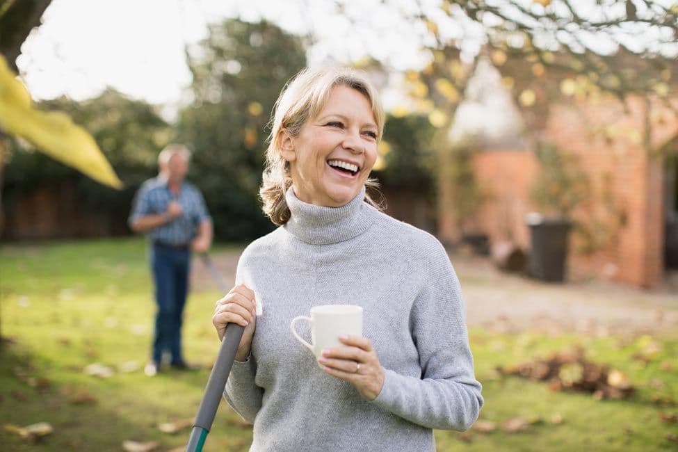 Woman smiling in garden