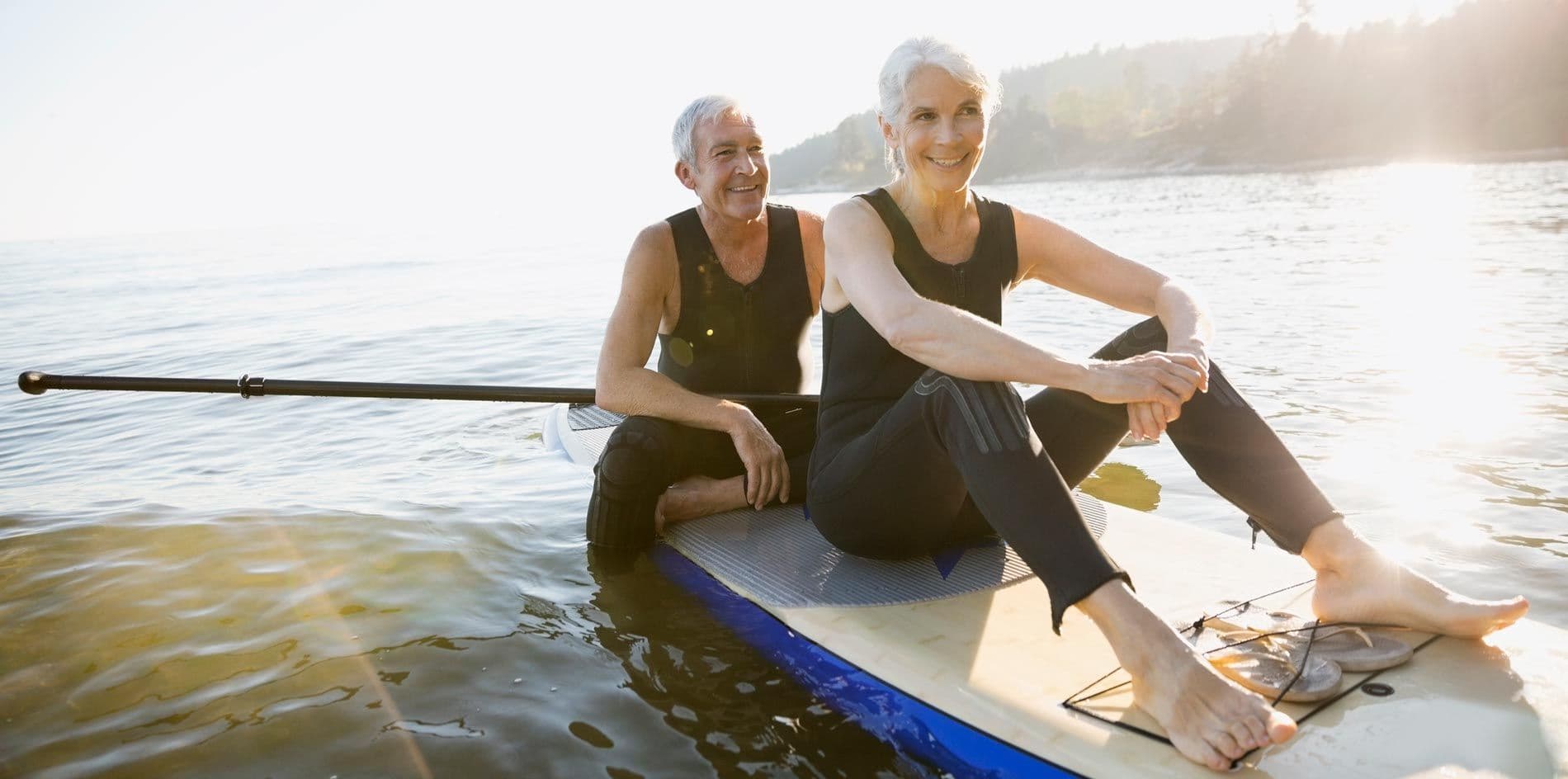 Older couple enjoying water sports.
