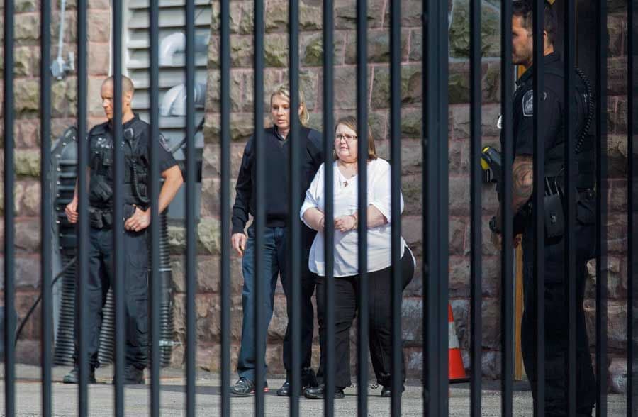 Elizabeth Wettlaufer is escorted from the provincial courthouse in Woodstock, Ont., on June 1, 2017.